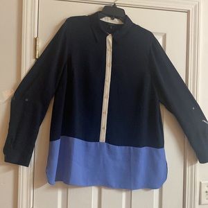 100% Polyester Navy and Carolina blue.Size XL  Beautiful long sleeves by Talbots